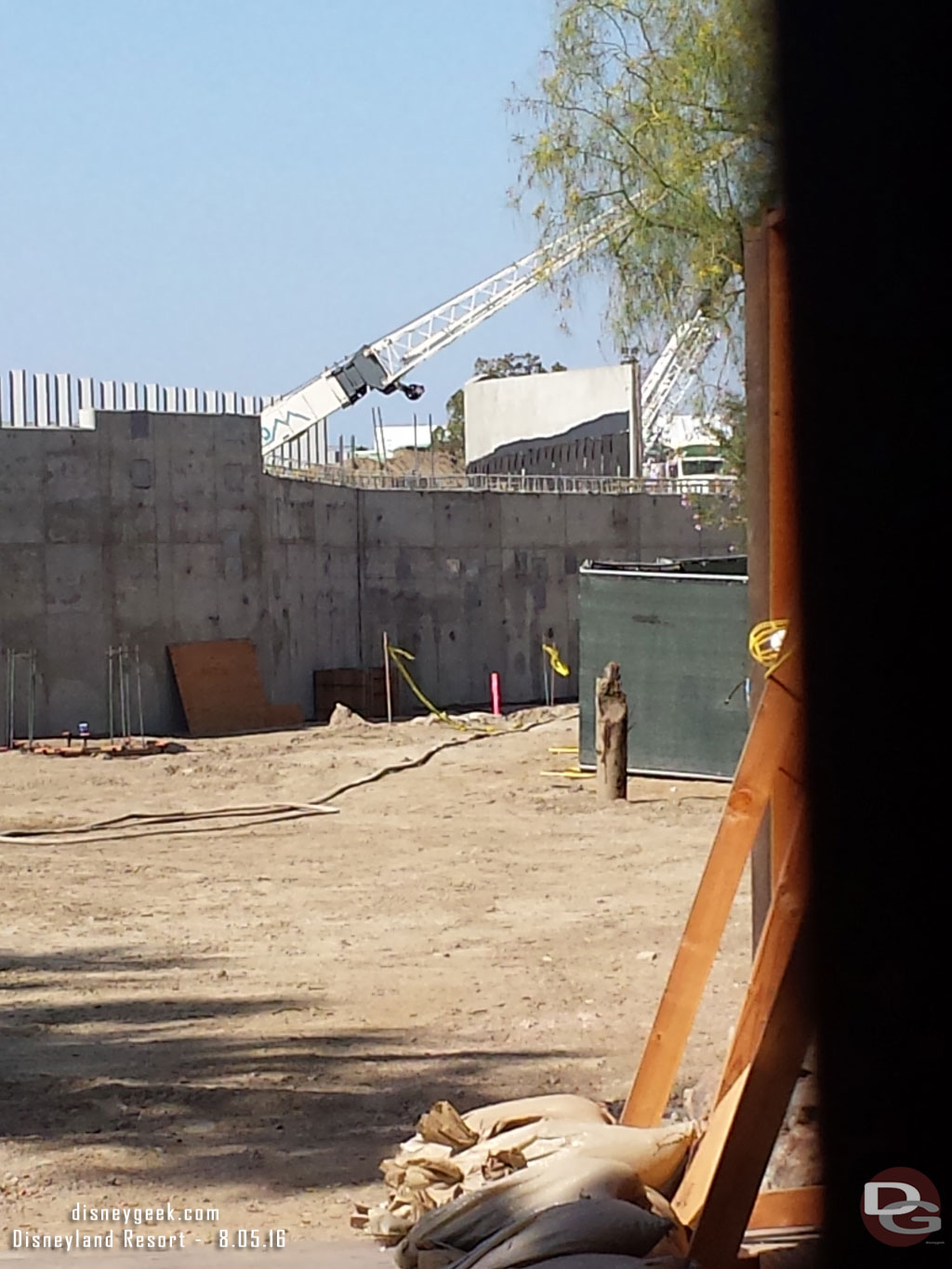 A clearer shot up the trail.  Notice the larger wall in the background and the steel i-beams visible beyond.  Assuming those will be for rock work.  From this angle you can see how they all line up.