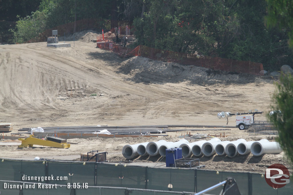 Pipes staged and ready to be installed in the foreground.  In the background rebar.