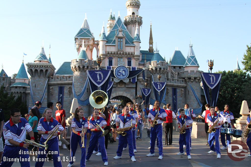 The All American College Band in front of Sleeping Beauty Castle.