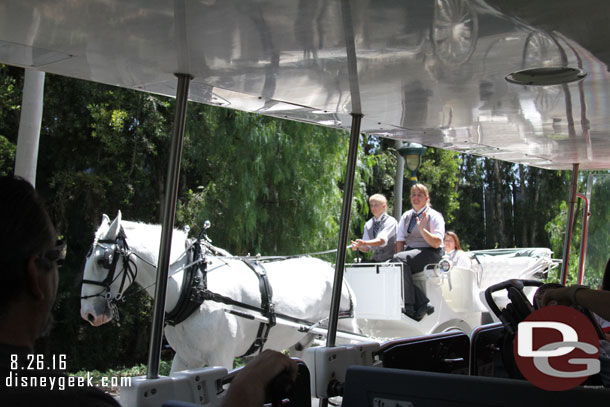 A horse drawn carriage passed our tram.