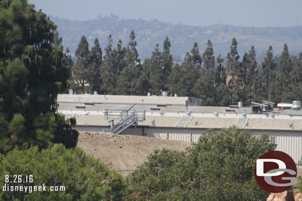 The mound of dirt is lower than the buildings again (the steps in the center are a launch point for fireworks.