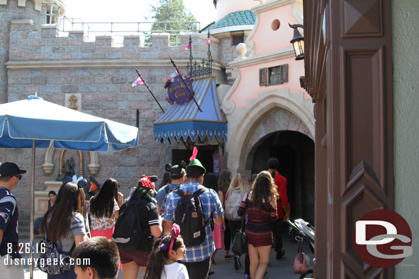 He had a band of followers in tow as he walked through Fantasyland.