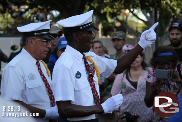 Ernie explaining about the coins and thanking the members for their service.