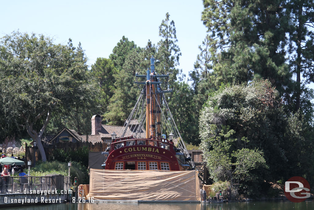 The Columbia is back in the harbor.  Note the top of the masts and a fair amount of rigging is gone.