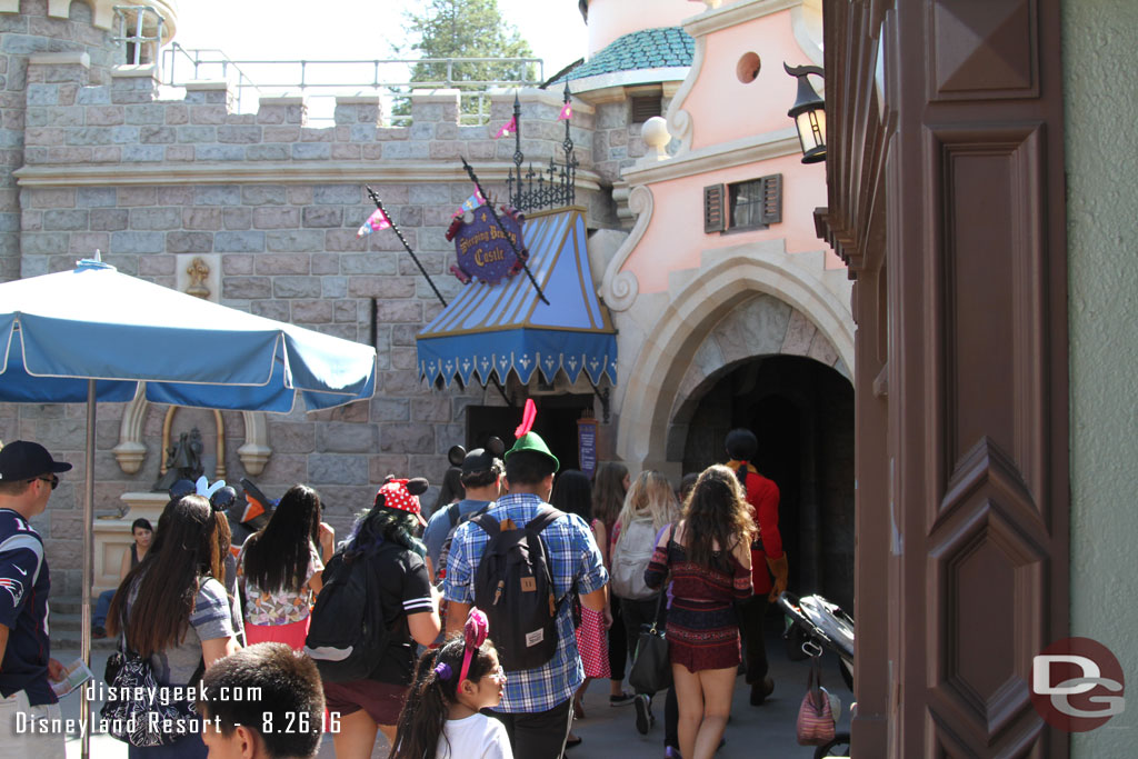 He had a band of followers in tow as he walked through Fantasyland.