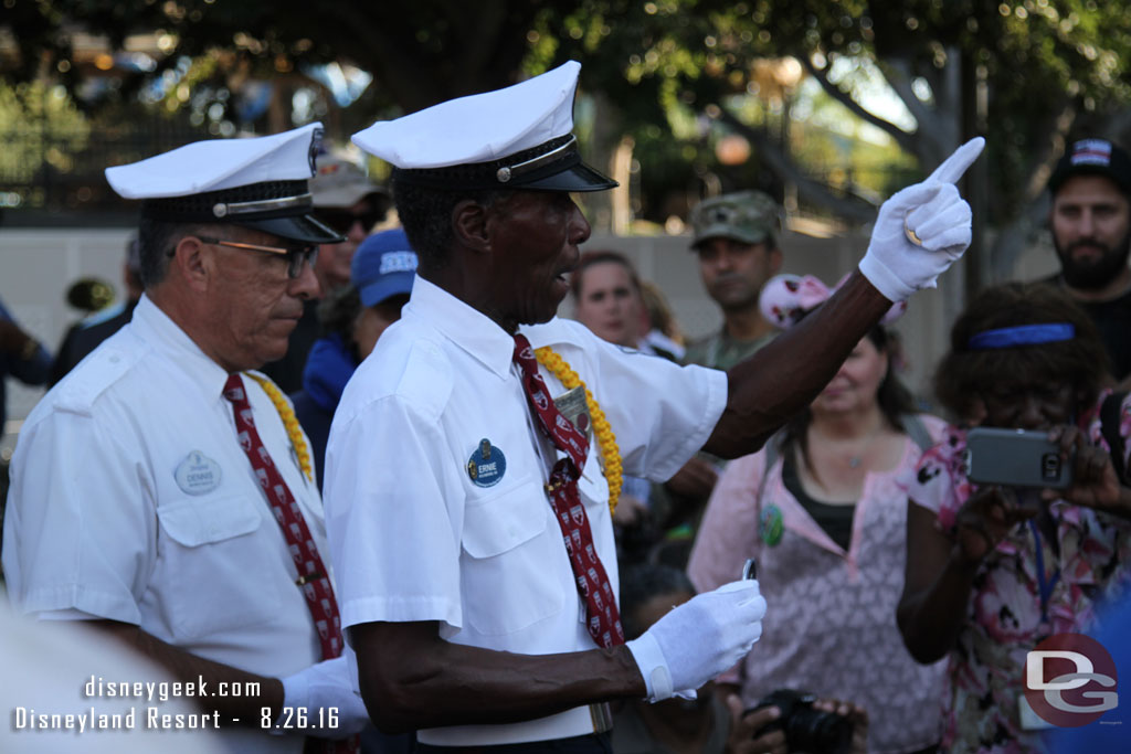 Ernie explaining about the coins and thanking the members for their service.