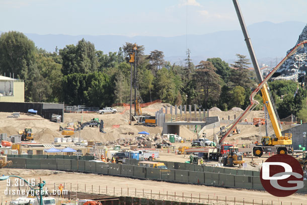 A closer look.  Looks like they are installing more i-beams for the retaining walls and rock work.  