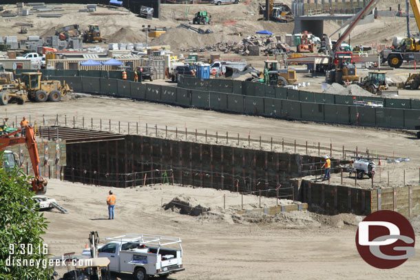 The pit looks to be dug for the basement of one of the show buildings.