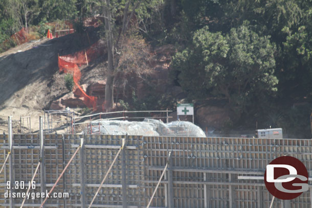 Looks like they have begun the rock work on the island side of the river.  You can just barely make out scaffolding and mesh for the rocks.