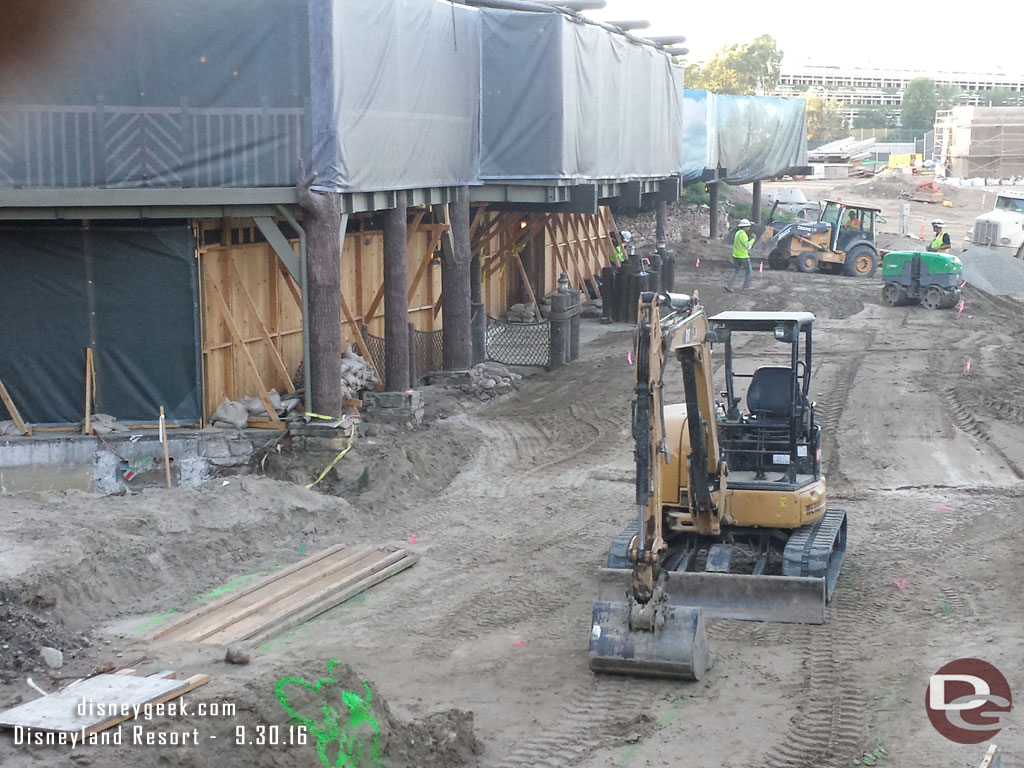 While eating you could hear they were dumping dirt and compacting it, making the seating area of the Hungry Bear shake.  Here is a look through the fence at the new walkway.