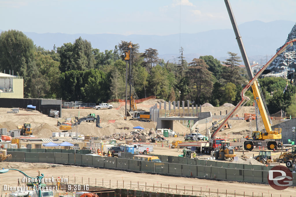 A closer look.  Looks like they are installing more i-beams for the retaining walls and rock work.  