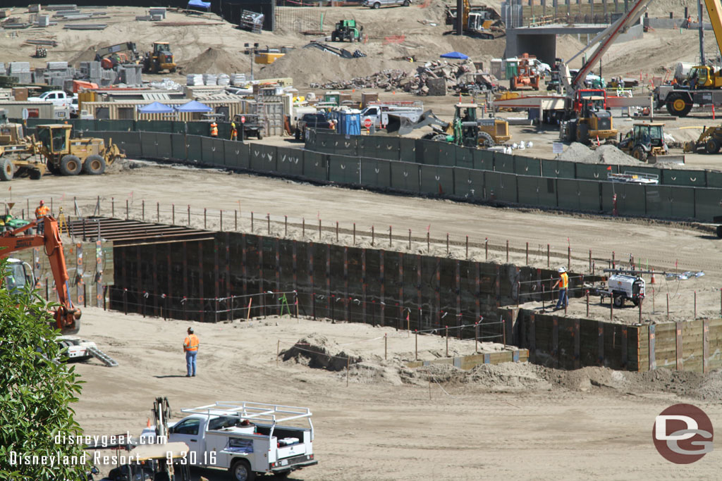 The pit looks to be dug for the basement of one of the show buildings.