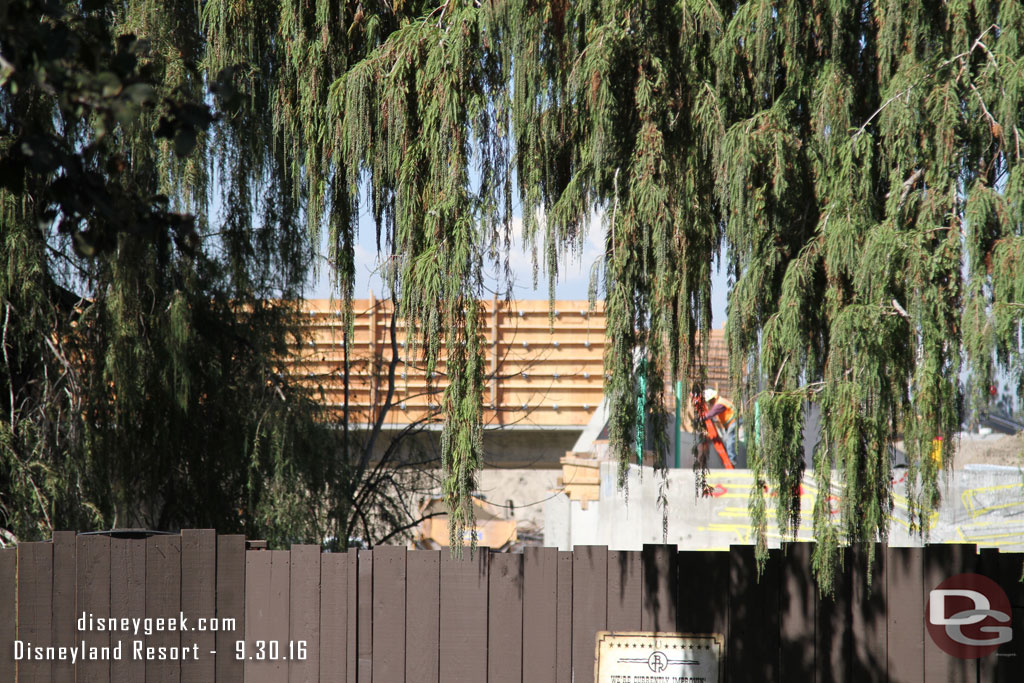 Moving over to Frontierland.  Here you can see under the bridge that will be the entrance.  That dump truck is on the far side of the site.  Looks like walls going up so will be interesting how much of the train you will be able to see or not see.