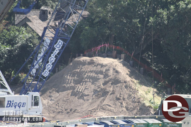 The beams we saw last visit have been driven into the ground and will be for a retaining wall near where the train exits Critter Country, so my guess was wrong last time.