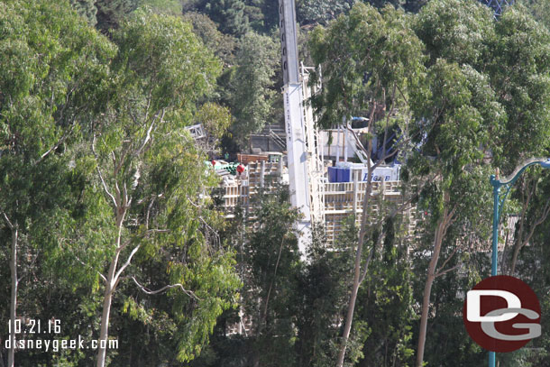 Through the trees you can see the new wall.