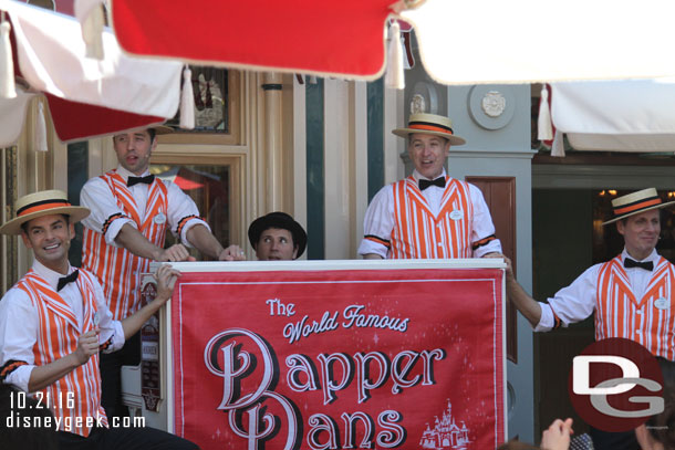 The Dapper Dans of Disneyland performing in their Halloween orange.