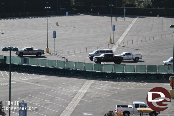 The temporary fencing along the far side of the work site.