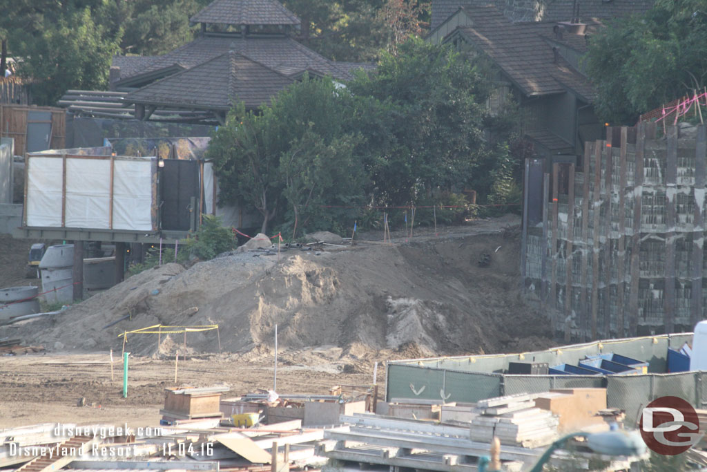 Where the train comes out from behind the Hungry Bear.  The new retaining wall on the right.