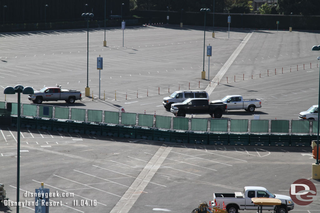 The temporary fencing along the far side of the work site.