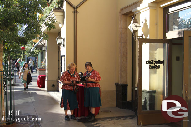 Cast members out on Buena Vista Street trading pins and answering questions