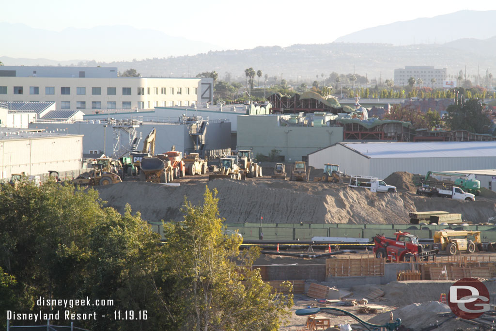 Starting on the left/north side of the site the mound of dirt is a parking lot this morning.