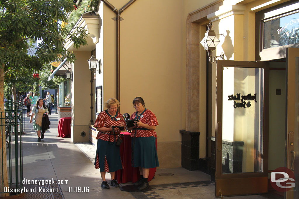 Cast members out on Buena Vista Street trading pins and answering questions