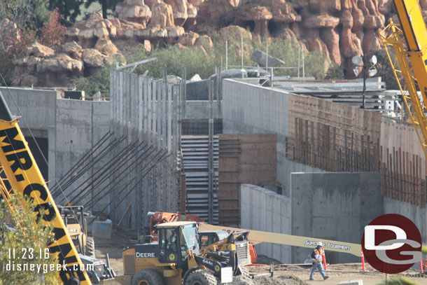 A closer look at the new wall going up.