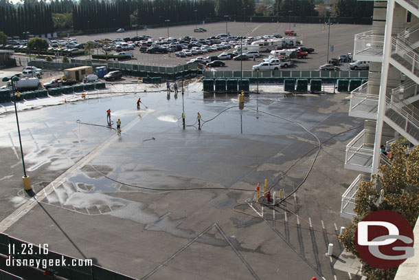 Hosing down the area.