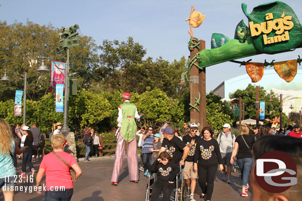 found the Stilt Circus performers near a Bugs Land.