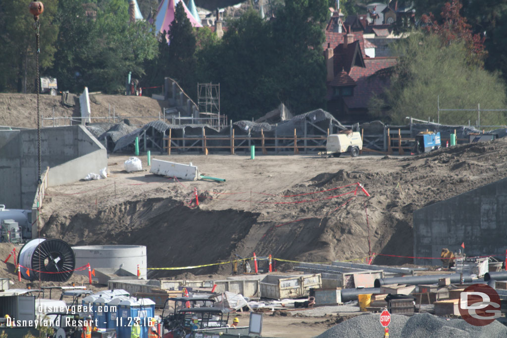 Rock work is visible over the dirt now.  That rock work is along the Big Thunder Trail and entrances to the Star Wars area.