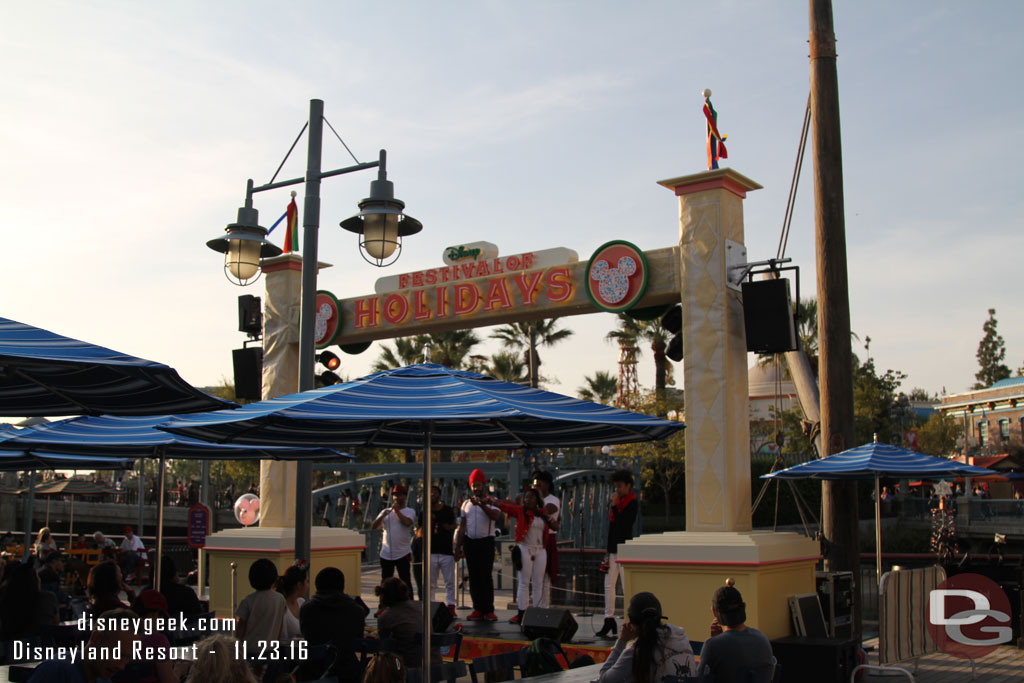 RAISE performing at the Pacific Wharf Stage during Festival of Holidays.