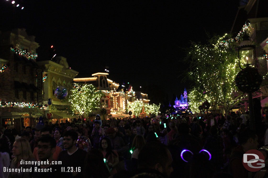 The green lights held by Cast Members marked my path up Main Street. It seemed a majority of guests along the parade route were exiting after the parade.