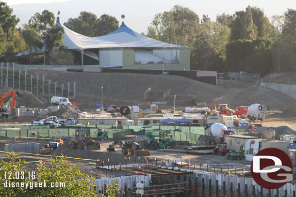 Dirt is almost to the top of the large retaining wall.  Looks like this will be part of the sound barrier between Fantasyland and Star Wars.