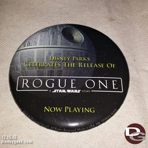 As you entered the Star Wars Launch Bay cast members were passing out Rogue One opening day buttons.