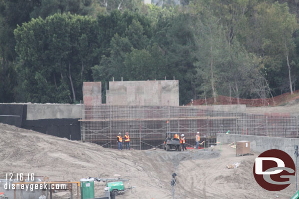 A closer look around the site.  The retaining wall is being finished up on the far side, to the right in this picture is the Fantasyland entrance.