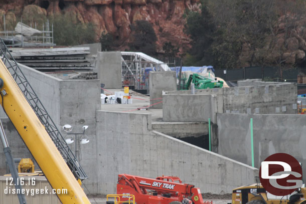 The marina looks to be enclosed now and concrete for the rock work support over top of it is taking shape.