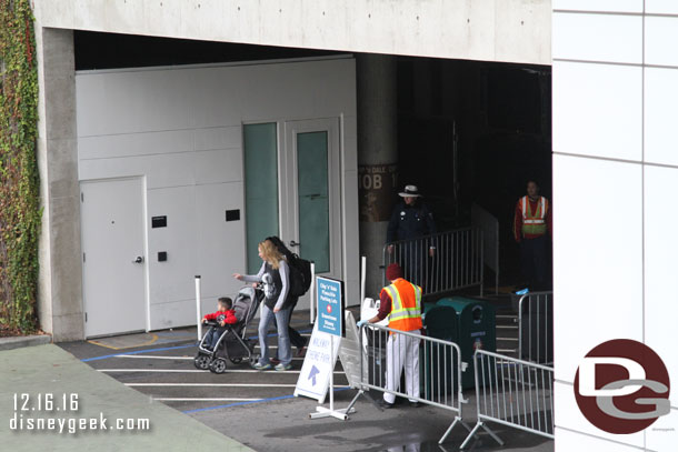 The trams now go down further in the garage before making the left to go outside.  The old driveway is now the cross walk for guests on the Chip and Dale level and Pinocchio lot.