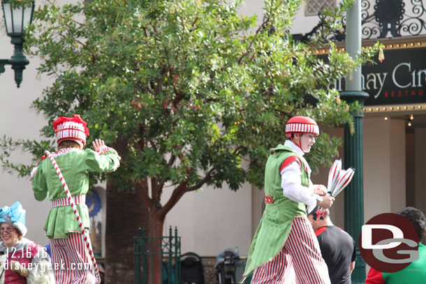 The Stilt Circus duo walking up the parade route.