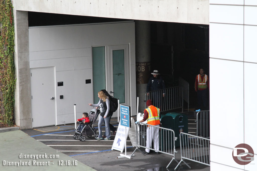 The trams now go down further in the garage before making the left to go outside.  The old driveway is now the cross walk for guests on the Chip and Dale level and Pinocchio lot.