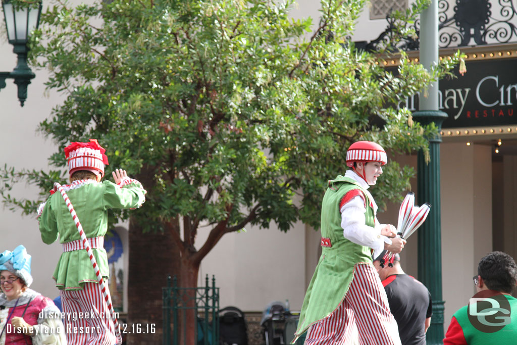 The Stilt Circus duo walking up the parade route.