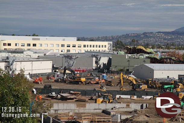 From the roof a pan across the site, as normal starting on the left/north and working to the right.   All traces of the large mound of dirt are now gone.. it is a parking lot for equipment.