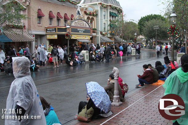 It was 4:24pm, some guests waiting for the 4:15pm parade to start.  They kept announcing it was delayed because of weather.