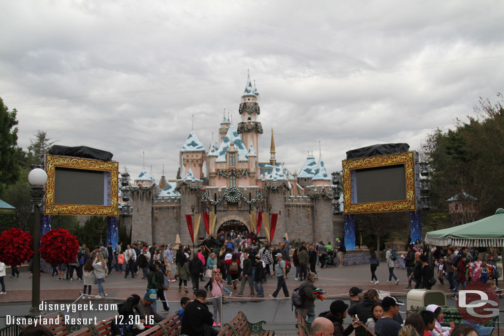 Sleeping Beauty Castle has lights and screens for New Years.