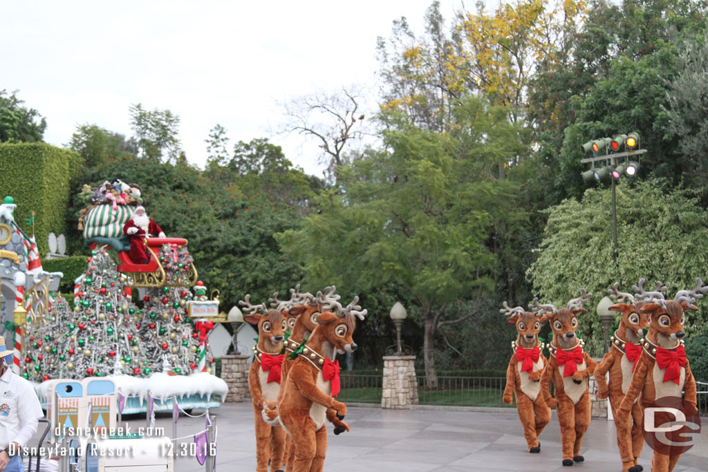 Santa closing out the parade with his reindeer