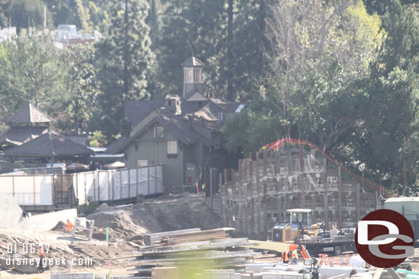 A closer look.  They were moving dirt around near where the train will come out from behind the Hungry Bear.  Seems footers should be going in for the new bridge.