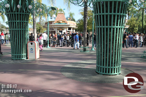 The tape is to mark an extended queue for the ticket booths.  When I arrived only the first switchback was in use.  Still a very long line to buy tickets.