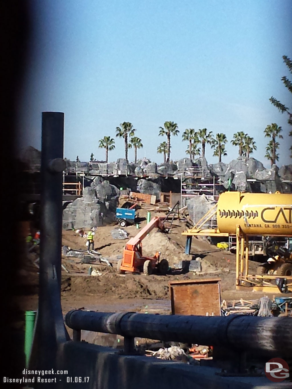 Looking through the fence, the railing is for the new walkway overlooking the canoe dock.