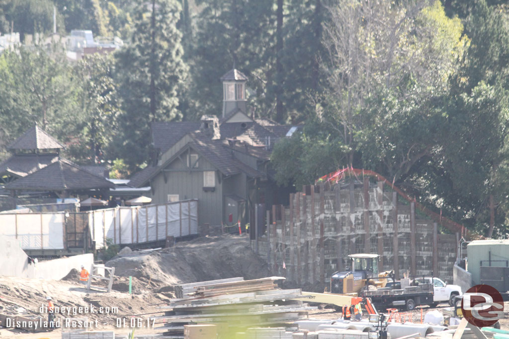 A closer look.  They were moving dirt around near where the train will come out from behind the Hungry Bear.  Seems footers should be going in for the new bridge.