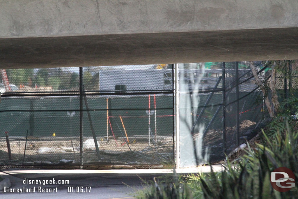 A look from ground level at work still going on as they build a new new backstage gate.  A horse trailer driving by on the new road as our tram passed by.