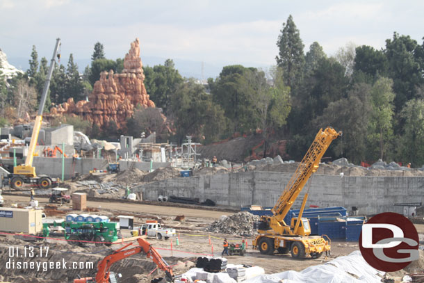 Continuing to the right you can see more rock work sticking up above the wall nearest the Rivers of America.